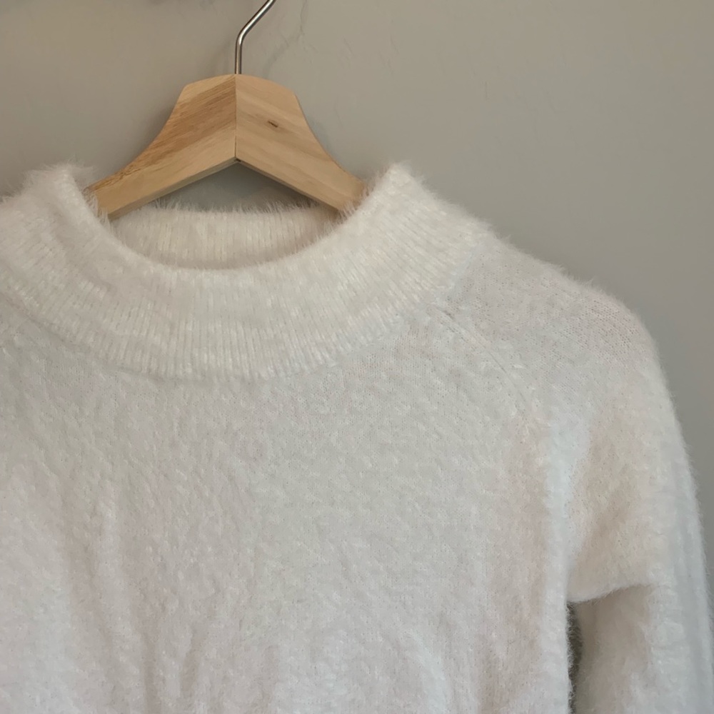 White fuzzy sweater